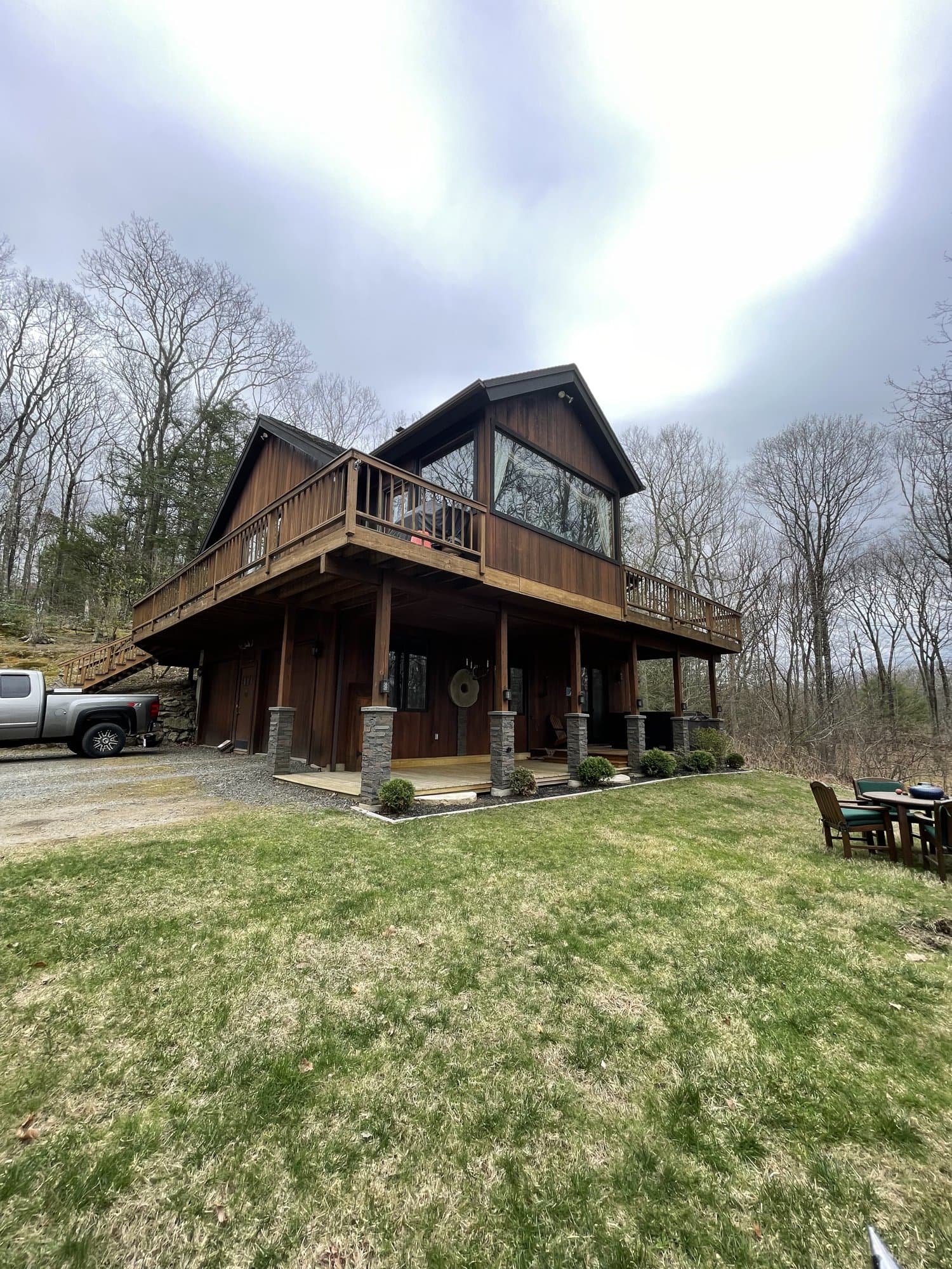 Cedar-stained home and deck completed by A-Laszlo Painting